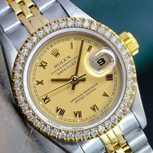 ROLEX LADIES DATEJUST GOLD STEEL CHAMPAGNE ROMAN DIAL DIAMOND BEZEL 26MM WATCH
